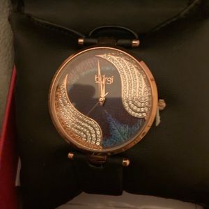Burgi brand women’s wristwatch. Brand new, with tags & accompanying paperwork.